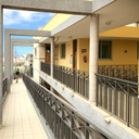 Leading lines to the person; other lines make the image dynamic.